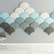 Illustration for article titled These Scale-Shaped Tiles Will Soundproof Your Room With Style
